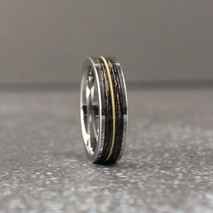 Tungsten wedding ring with guitar string